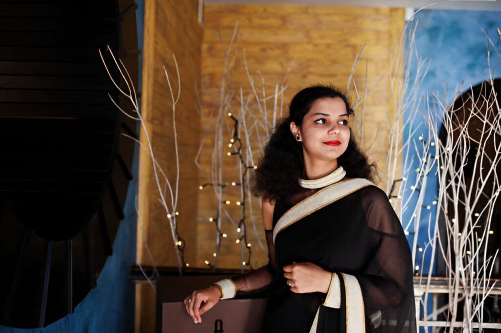 black saree with golden border